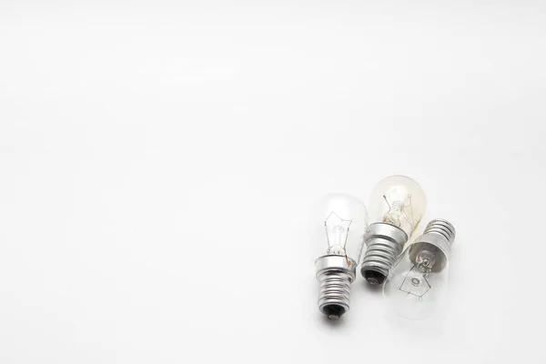 A small filament lamp on a white background