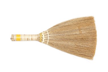 Beyaz arka plan üzerinde küçük bir süpürge