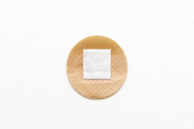 Medical adhesive plaster on white background