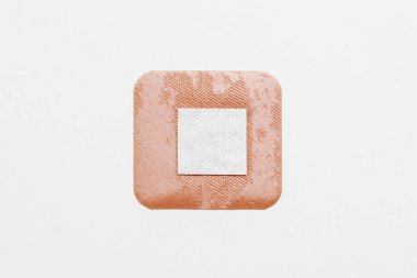 Medical adhesive plaster on white background