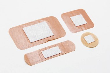 Medical adhesive plaster on white background