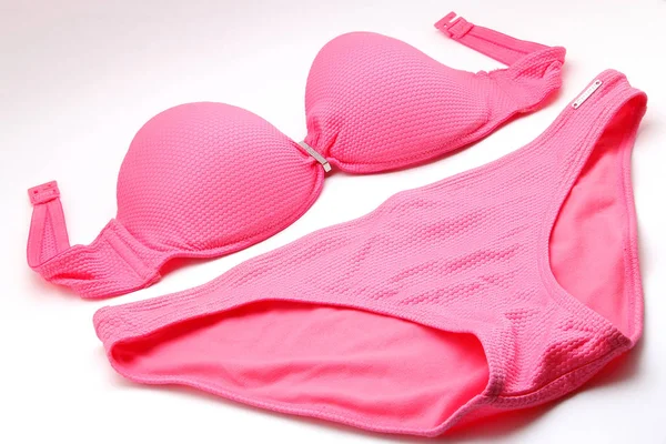 Pink bikini on white background — Stock Photo, Image