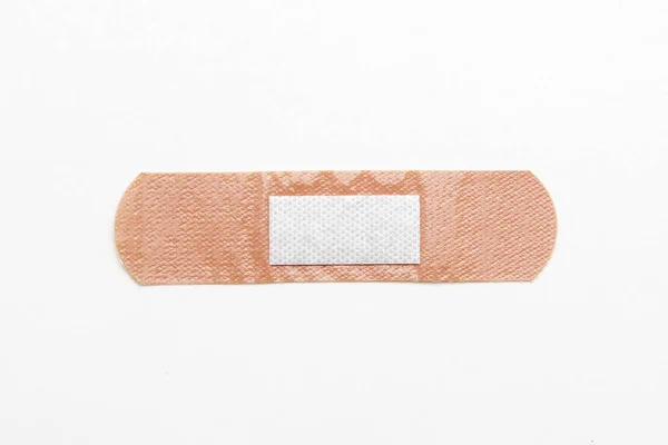 Medical adhesive plaster on white background — Stock Photo, Image