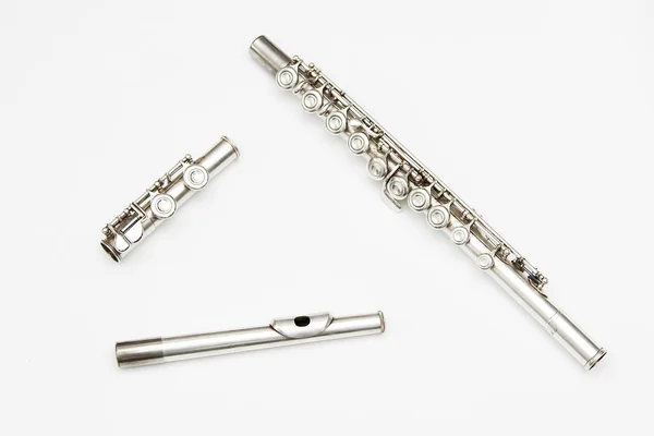 Металева флейта на білому тлі — стокове фото
