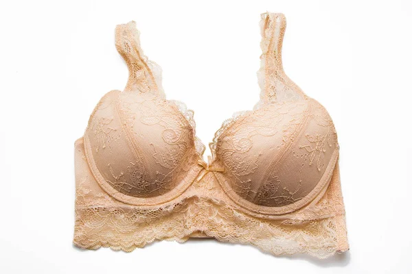 Beautiful beige lingerie on white background — Stock Photo, Image