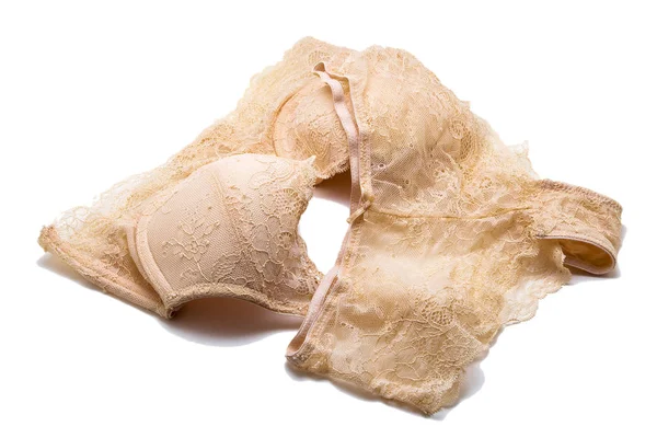 Bella lingerie beige su sfondo bianco — Foto Stock