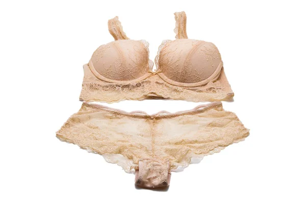 Bella lingerie beige su sfondo bianco — Foto Stock