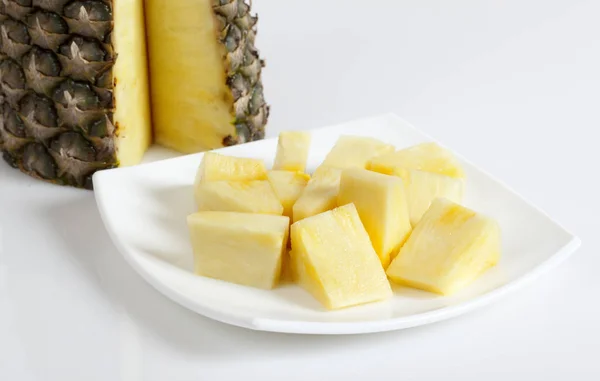 Pineapple chunks in the plate — Stock Photo, Image