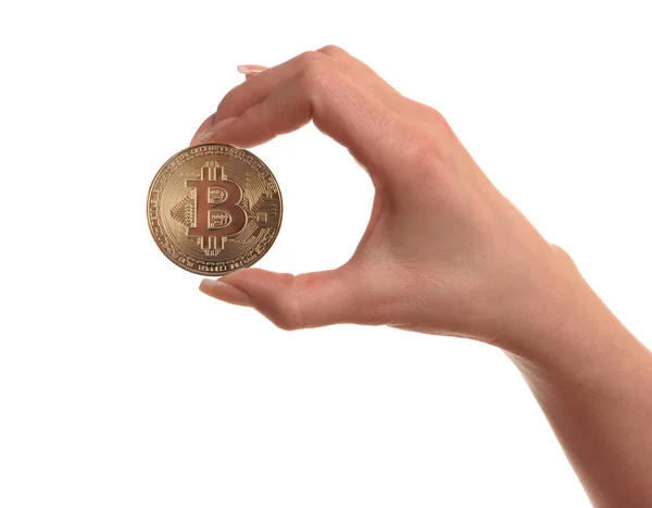 Una moneda de oro Bitcoin en la mano de la chica, aislado en bac blanco — Foto de Stock