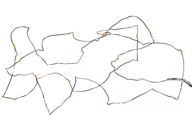 Bakır dize izole bir arka plan üzerinde ışık