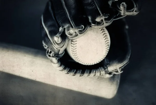 Baseball glove, ball and bat in black and white