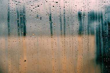 Rainy weather condensation texture on window.