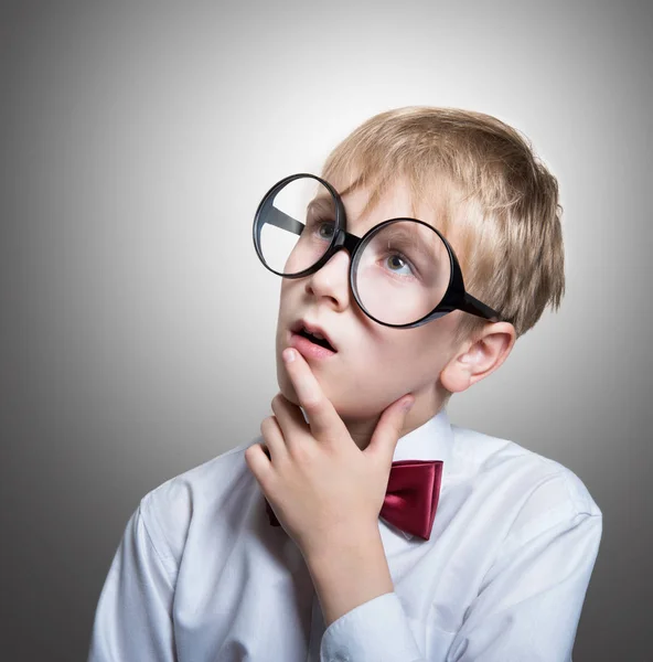 Pensive boy in the bow tie — Stock Photo, Image