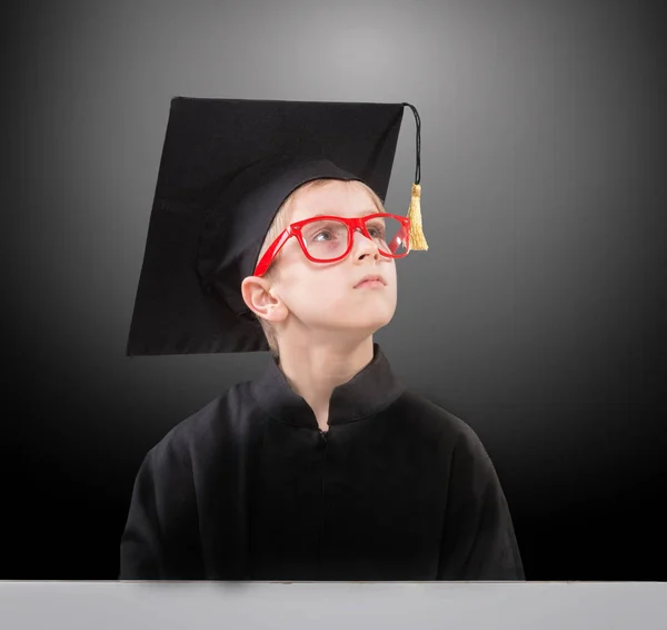 Schoolboy dreaming of his future — Stock Photo, Image