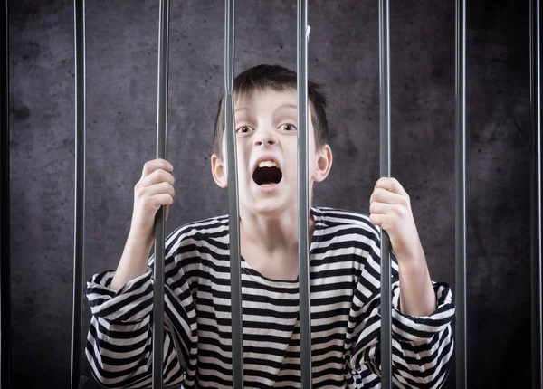 Boy in prison — Stock Photo, Image