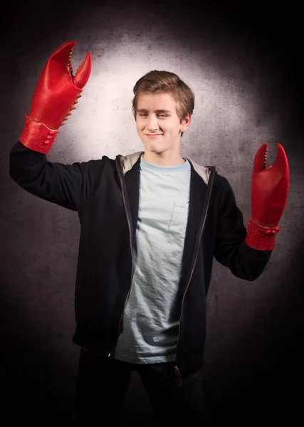 A dancing boy with lobster claw — Stock Photo, Image