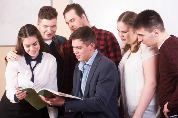 Young people studying with books on white desk. Beautiful girls — Stock Photo, Image