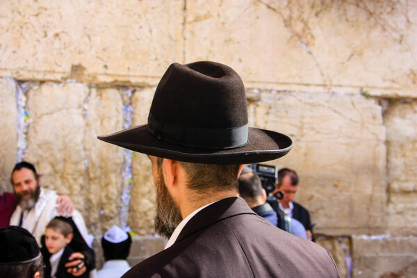 Jerusalem Israel  March 6-2018 Unknowns people praying front the Western wall at the old city of Jerusalem morning
