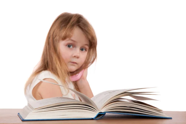 Çocuk arkasında bir kitap — Stok fotoğraf