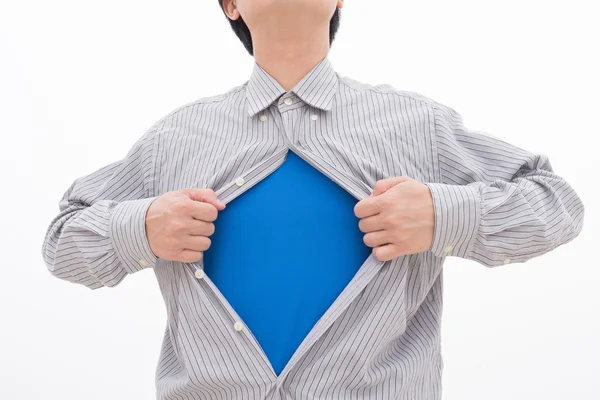 Hombre de negocios tirando de su camiseta —  Fotos de Stock