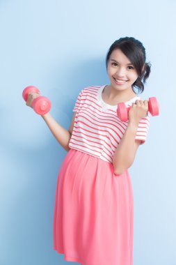 pregnant woman hold dumbell  clipart