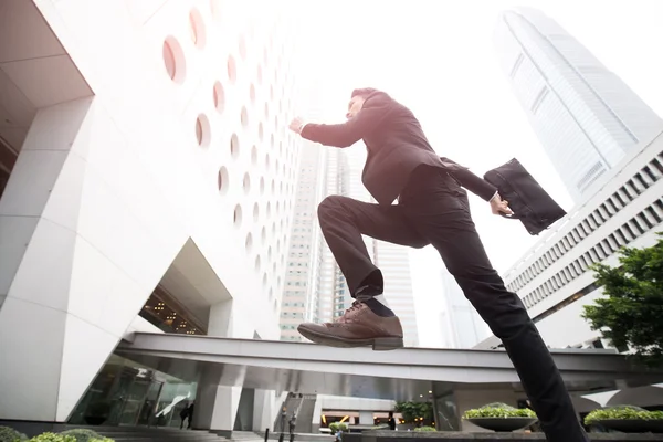 Businessman is running in honkong — Stock Photo, Image
