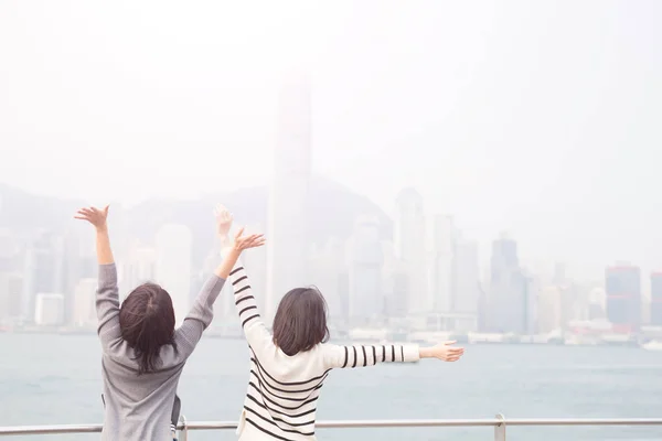 Two beautiful  woman feeling  free — Stock Photo, Image