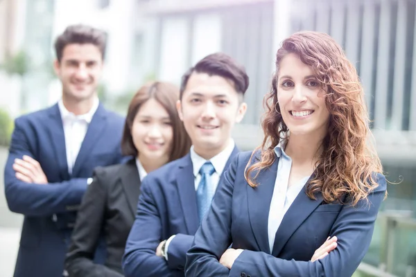 Geschäftsleute-Team kreuzte den Arm — Stockfoto