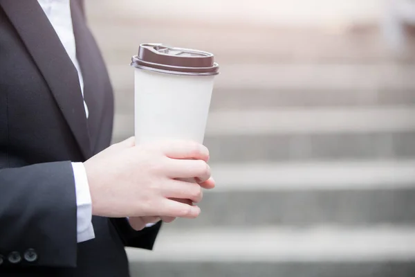 Businessman  holding coffee — Stock Photo, Image