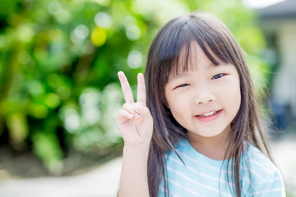 Little girl smile happily Stock Image