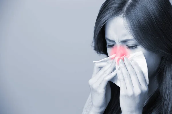 A Woman catches a cold — Stock Image A Woman catches a cold Royalty Free Stock Images