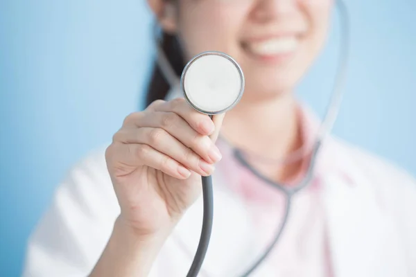 Woman doctor showing  stethoscope — Stock Photo, Image