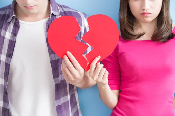 Young couple with broken heart — Stock Photo, Image