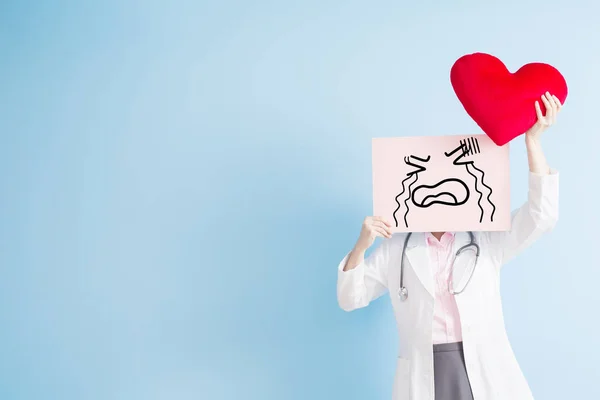 Woman doctor with  cry billboard — Stock Photo, Image