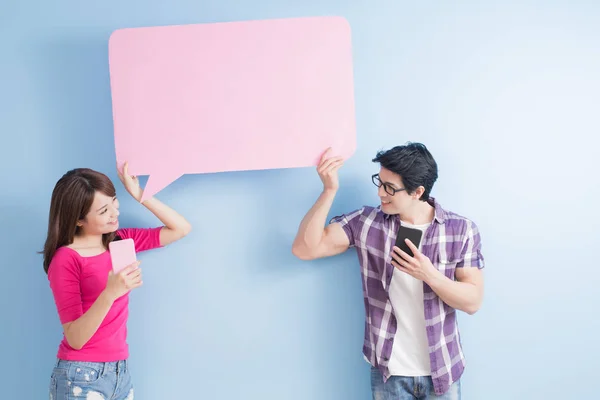 young couple with  speech bubble