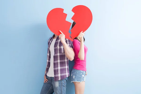 Young couple with broken heart — Stock Photo, Image