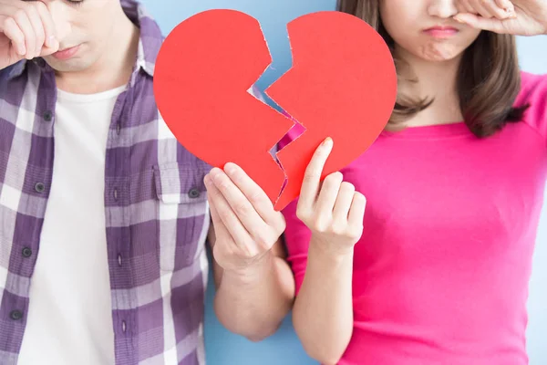 Young couple with broken heart — Stock Photo, Image