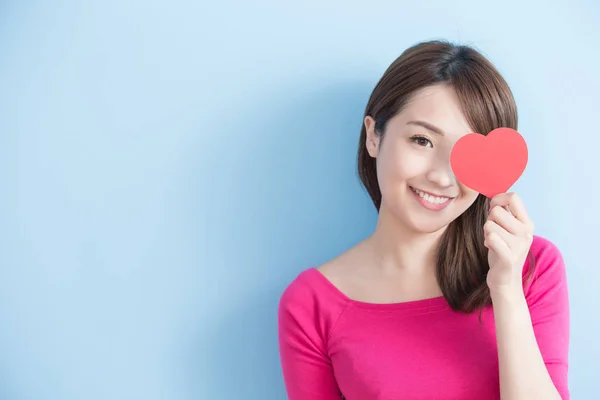 Woman holding red love heart — Stock Photo, Image