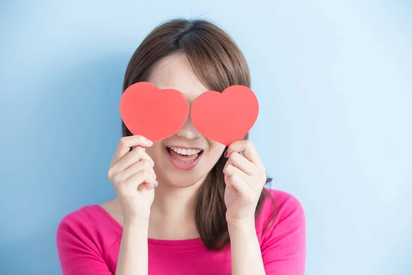 Woman holding red love hearts — Stock Photo, Image