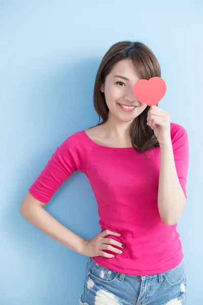 Woman holding red love heart — Stock Photo, Image