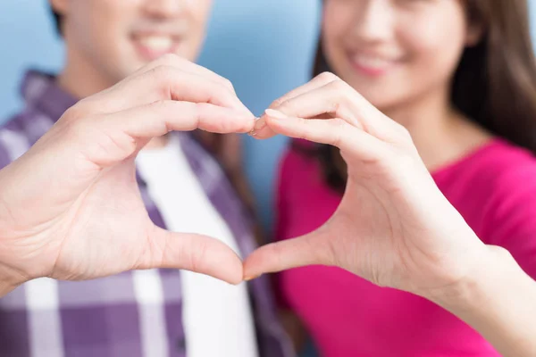 Young couple showing  heart — Stock Photo, Image