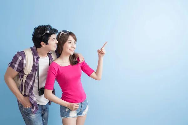 Couple showing  something — Stock Photo, Image