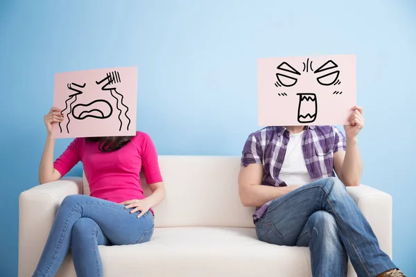 Couple holding  billboards and sitting — Stock Photo, Image