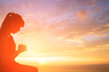 woman praying  pious with sunrise clipart