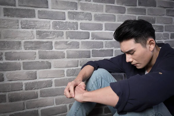 Man sitting  depressed — Stock Photo, Image