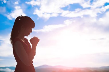 young woman praying  clipart