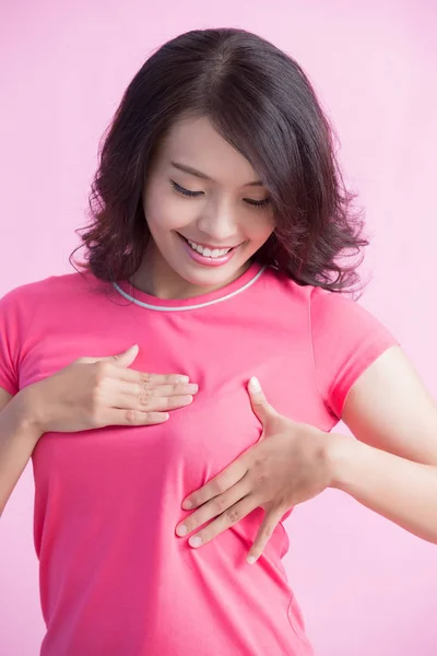 Happy woman checking  her chest. — Stock Photo, Image