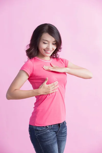 Happy woman checking  her chest — Stock Photo, Image