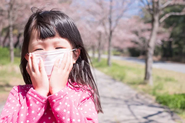 Little girl wearing  mask — Stock Photo, Image