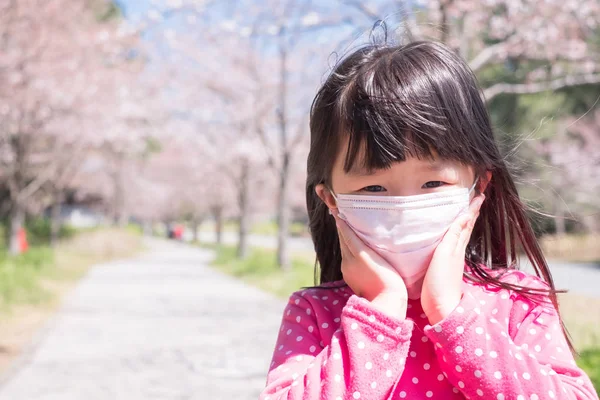 Little girl wearing  mask — Stock Photo, Image